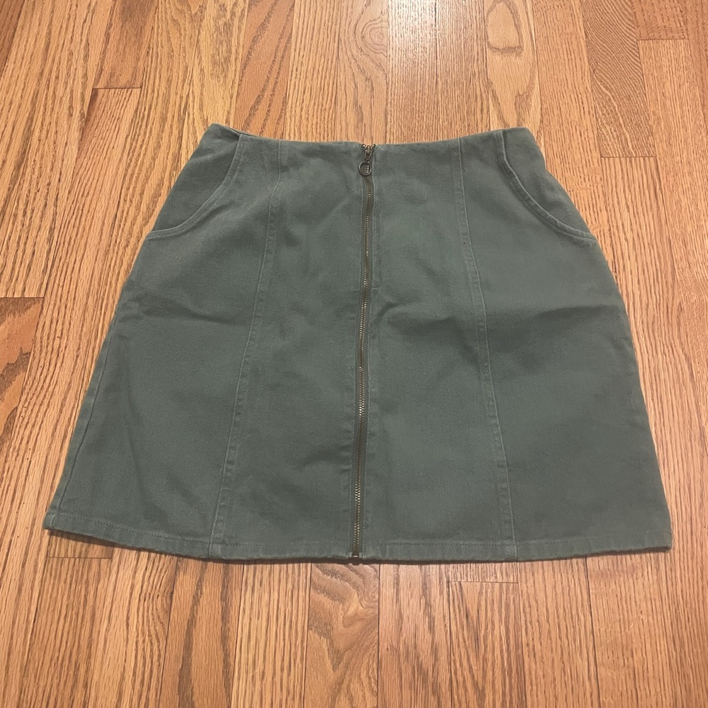 Green zip up mini skirt